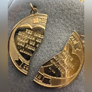 Brand new 14 karat gold
Mizpah two-piece break-apart pendant